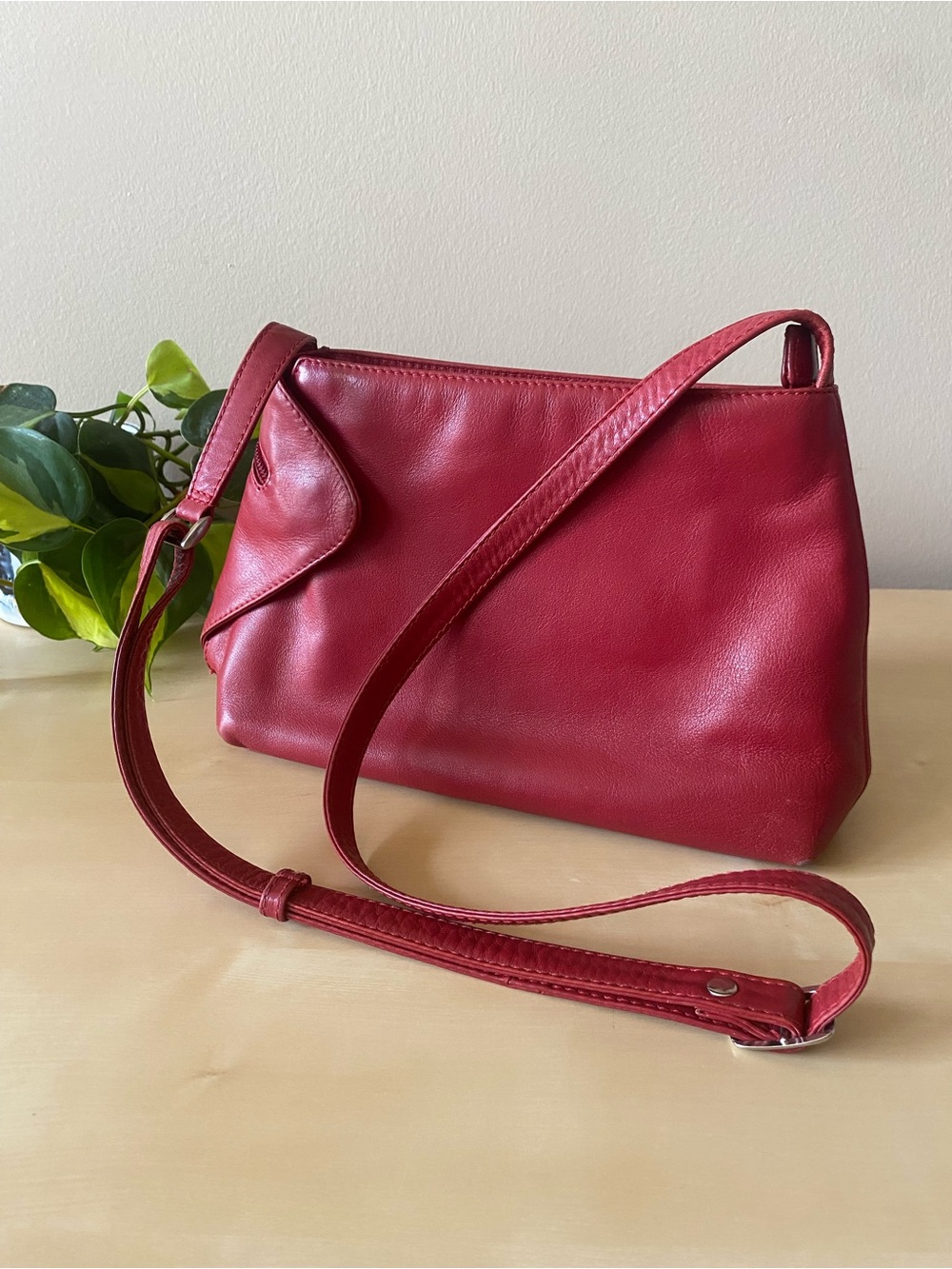 Derek Alexander cherry red leather purse with top zip and magnetic gusset